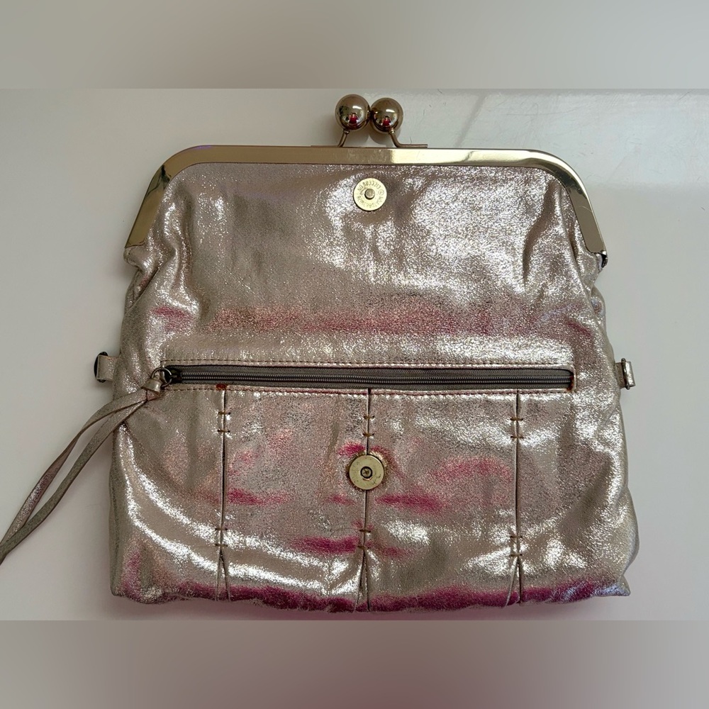 Jessica Simpson Golden Color Designer Clutch Bag. Very spacious two compartments